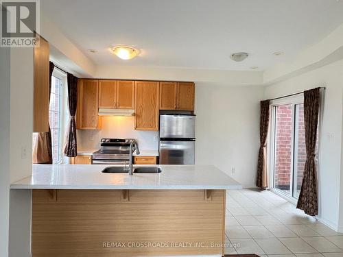 56 - 407 Beechgrove Drive, Toronto, ON - Indoor Photo Showing Kitchen With Double Sink