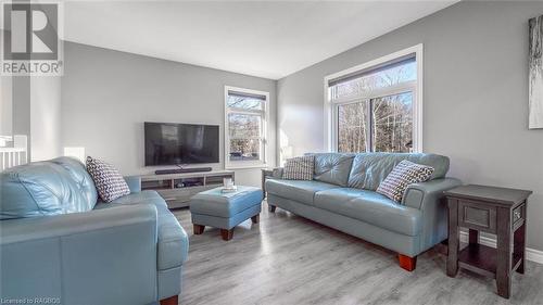 Sit back and relax as natural light fills your space. - 18 Walker Way, Sauble Beach, ON - Indoor Photo Showing Living Room