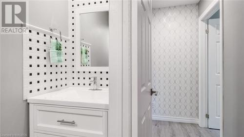 Everyone will want to wash their hands in this gorgeous powder room! - 18 Walker Way, Sauble Beach, ON - Indoor Photo Showing Other Room