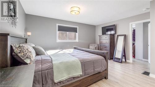 With a stunning ensuite and incredible dressing room, this primary suite will truly be the envy of everyone! - 18 Walker Way, Sauble Beach, ON - Indoor Photo Showing Bedroom