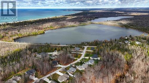 Just minutes from Canada's #1 fresh water beach and situated in an upscale Sauble Beach development. - 18 Walker Way, Sauble Beach, ON - Outdoor With Body Of Water With View