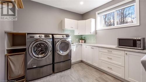 No one wants to do laundry...but this incredible room makes it so much easier! - 18 Walker Way, Sauble Beach, ON - Indoor Photo Showing Laundry Room