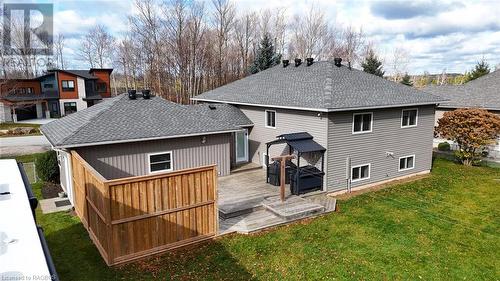 Enjoy the outdoors on your large back deck, BBQ and have fun! - 18 Walker Way, Sauble Beach, ON - Outdoor With Exterior