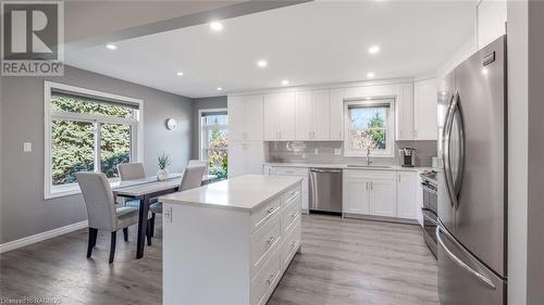 Custom cabinetry, luxury vinyl plank flooring and quartz countertops provide elegance and function! - 18 Walker Way, Sauble Beach, ON - Indoor