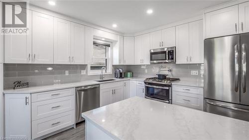 Cooking is a breeze in this kitchen complete with a pot-filler! - 18 Walker Way, Sauble Beach, ON - Indoor Photo Showing Kitchen With Upgraded Kitchen