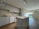 332 - 50 Herrick Avenue, St. Catharines, ON  - Indoor Photo Showing Kitchen 