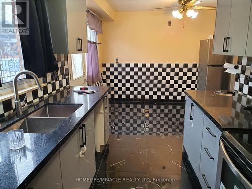 Upper - 7618 Discus Crescent, Mississauga, ON - Indoor Photo Showing Kitchen With Double Sink