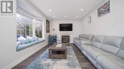 27 Braydon Boulevard, Brampton, ON - Indoor Photo Showing Living Room With Fireplace