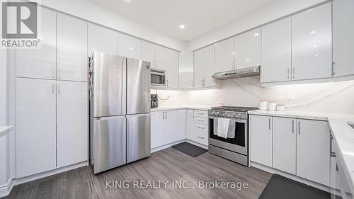 27 Braydon Boulevard, Brampton, ON - Indoor Photo Showing Kitchen With Upgraded Kitchen