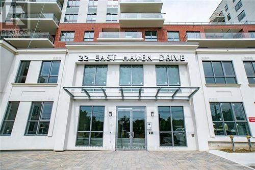 1120 - 22 East Haven Drive, Toronto, ON - Outdoor With Balcony With Facade