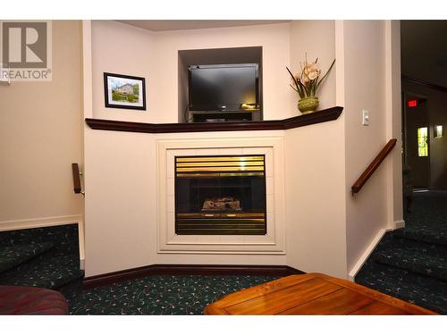 940 Glenwood Avenue Unit# 104, Kelowna, BC - Indoor With Fireplace