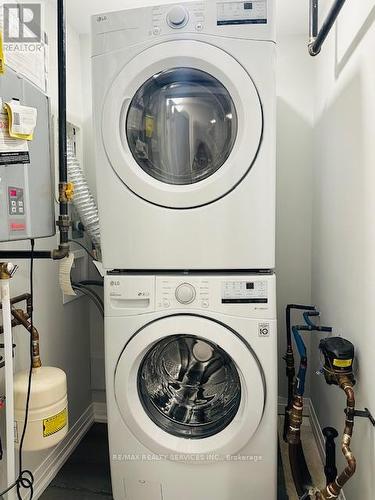 64 - 6705 Cropp Street, Niagara Falls, ON - Indoor Photo Showing Laundry Room