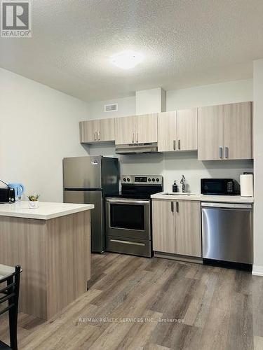 64 - 6705 Cropp Street, Niagara Falls, ON - Indoor Photo Showing Kitchen With Stainless Steel Kitchen