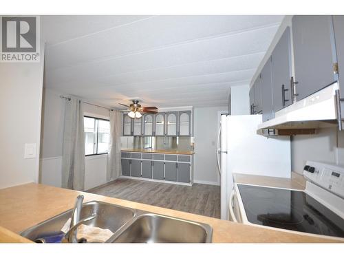 201 1427 Dog Creek Road, Williams Lake, BC - Indoor Photo Showing Kitchen With Double Sink