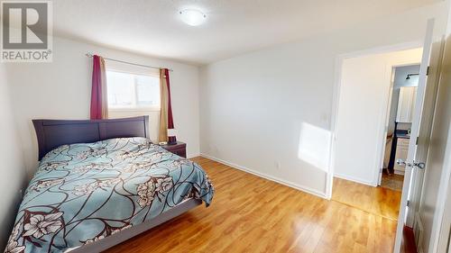 9911 97 Avenue, Fort St. John, BC - Indoor Photo Showing Bedroom