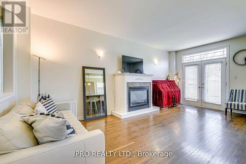 2317 Foxfield Road, Oakville, ON - Indoor Photo Showing Living Room With Fireplace