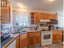 1123 King Street Unit# 201, Penticton, BC  - Indoor Photo Showing Kitchen With Double Sink 