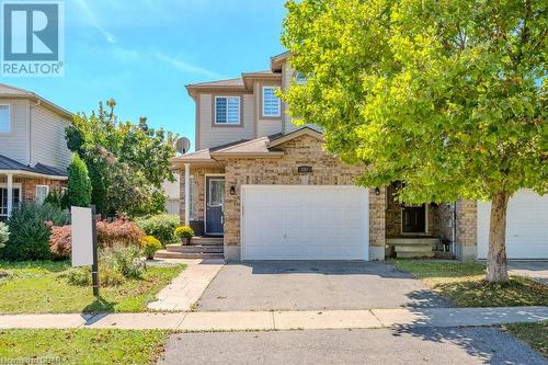 View of front of property with a garage - 192 Severn Drive, Guelph, ON - Outdoor With Facade