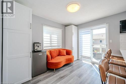 Sitting room with light wood-type flooring and a healthy amount of sunlight - 192 Severn Drive, Guelph, ON - Indoor