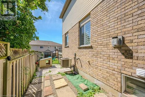 View of side of home featuring cooling unit - 192 Severn Drive, Guelph, ON - Outdoor With Deck Patio Veranda With Exterior