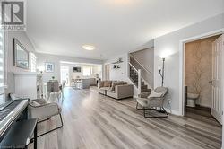 Living room featuring light hardwood / wood-style floors - 