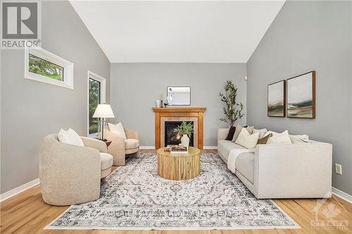 2 Insmill Crescent, Ottawa, ON - Indoor Photo Showing Living Room With Fireplace