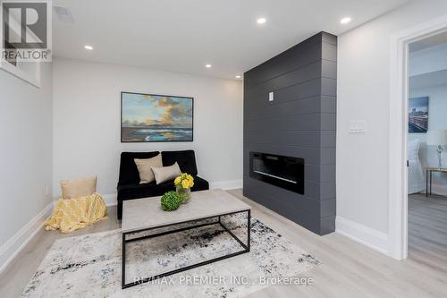 30 Prady Lane, New Tecumseth, ON - Indoor Photo Showing Living Room With Fireplace