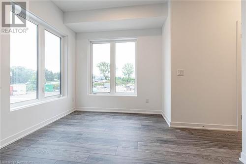 Empty room featuring dark hardwood / wood-style flooring - 1095 Cooke Boulevard Unit# 42, Burlington, ON - Indoor Photo Showing Other Room