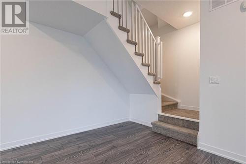 Stairs featuring hardwood / wood-style floors - 1095 Cooke Boulevard Unit# 42, Burlington, ON - Indoor Photo Showing Other Room