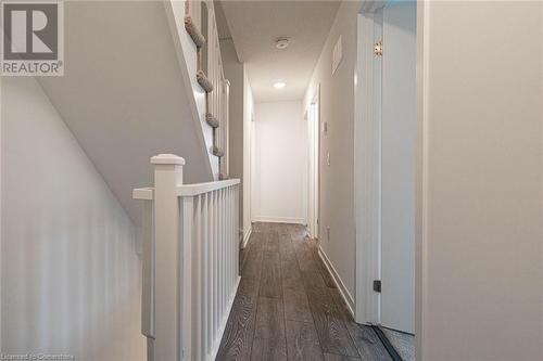 Hallway with dark wood-type flooring - 1095 Cooke Boulevard Unit# 42, Burlington, ON - Indoor Photo Showing Other Room