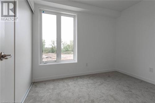 Spare room with light carpet - 1095 Cooke Boulevard Unit# 42, Burlington, ON - Indoor Photo Showing Other Room