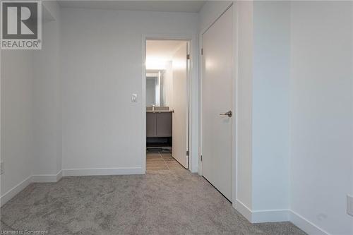 Spare room featuring light carpet - 1095 Cooke Boulevard Unit# 42, Burlington, ON - Indoor Photo Showing Other Room