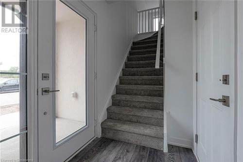 Stairs with hardwood / wood-style floors - 1095 Cooke Boulevard Unit# 42, Burlington, ON - Indoor Photo Showing Other Room