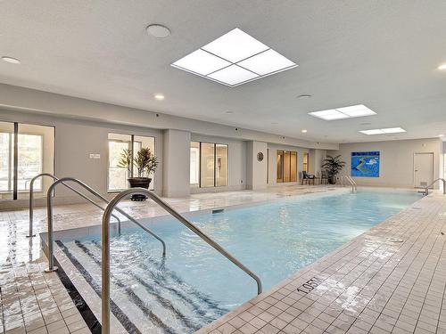 Piscine - 206-5105 Boul. De L'Assomption, Montréal (Rosemont/La Petite-Patrie), QC - Indoor Photo Showing Other Room With In Ground Pool