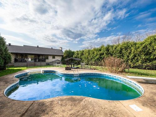 Back facade - 443 Rue Bernard, Saint-Alexandre, QC - Outdoor With In Ground Pool With Backyard