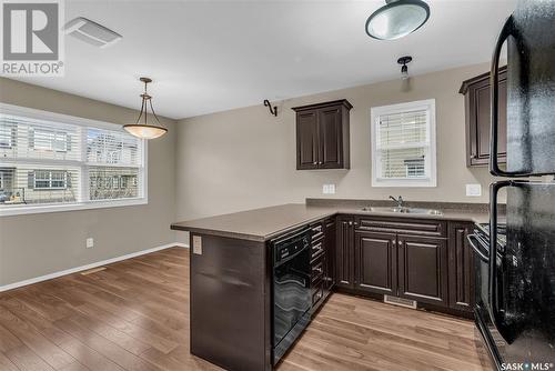 562 150 Langlois Way, Saskatoon, SK - Indoor Photo Showing Kitchen With Double Sink