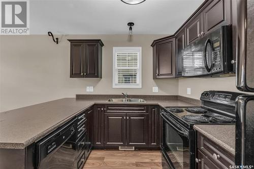 562 150 Langlois Way, Saskatoon, SK - Indoor Photo Showing Kitchen With Double Sink