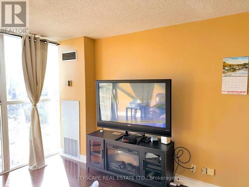 1108 - 25 Trailwood Drive, Mississauga, ON - Indoor With Fireplace