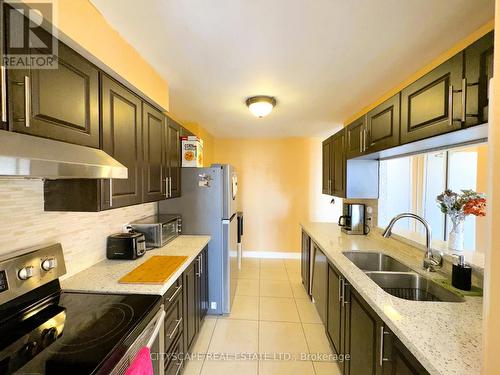 1108 - 25 Trailwood Drive, Mississauga, ON - Indoor Photo Showing Kitchen With Double Sink