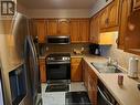 54 Sutton Drive, Leamington, ON  - Indoor Photo Showing Kitchen With Double Sink 