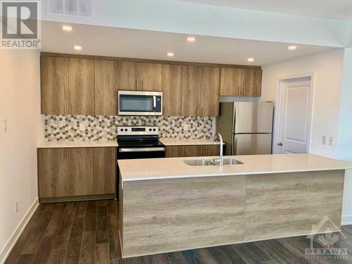 35 Overberg Way Unit#D, Kanata, ON - Indoor Photo Showing Kitchen With Stainless Steel Kitchen With Double Sink With Upgraded Kitchen