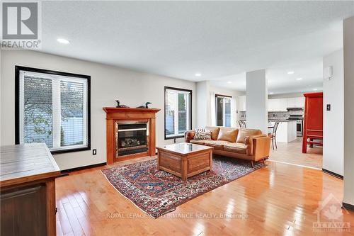 2103 Esprit Drive, Ottawa, ON - Indoor Photo Showing Living Room With Fireplace