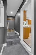 Mudroom access off of kitchen - luxury vinyl tile - 