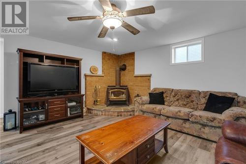 Family room with wood stove - 386 Mechanics Street, Brussels, ON - Indoor Photo Showing Living Room With Fireplace