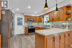 Kitchen - door access to mudroom that connects to the attached garage - perfect for bringing in groceries! - 