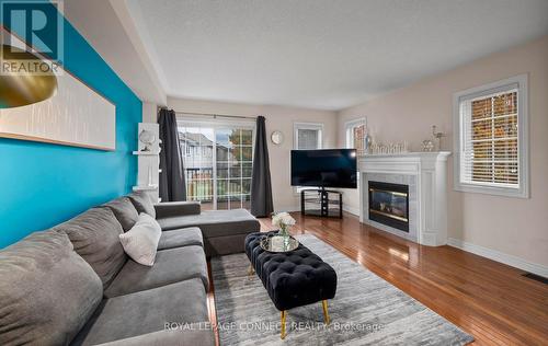 22 - 1100 Begley Street, Pickering, ON - Indoor Photo Showing Living Room With Fireplace