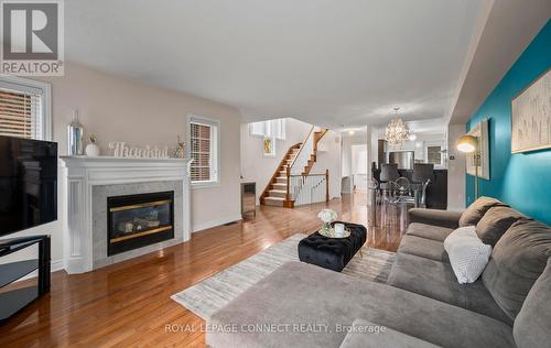 22 - 1100 Begley Street, Pickering, ON - Indoor Photo Showing Living Room With Fireplace