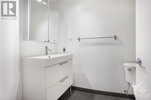 Full bathroom has been recently renovated and features updated vanity, shower/ tub combination with tile wall - 364 Cooper Street Unit#403, Ottawa, ON - Indoor Photo Showing Bathroom