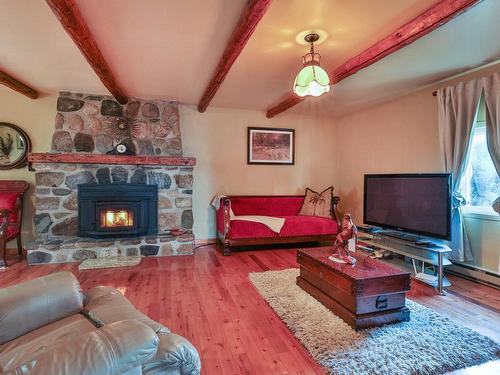 Salon - 371 Ch. De La Grande-Ligne E., Saint-Jean-Sur-Richelieu, QC - Indoor Photo Showing Living Room With Fireplace