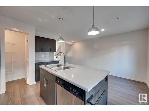 #24 2215 24 St Nw, Edmonton, AB - Indoor Photo Showing Kitchen With Double Sink